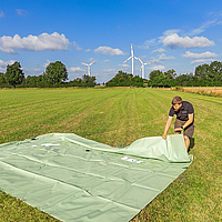 Flexible storage container - unrolling in action