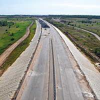 Dike covering with the help of concrete mats for erosion control during floods