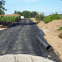 Basetrac Grid along a road construction site for base course reinforcement