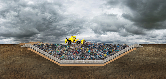 Landfill for the storage of flood protection A wheel loader loads flood debris into a landfill liner system for temporary or long-term waste transfer