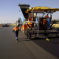 Asphalting of the prepared HaTelit layer by a tar machine