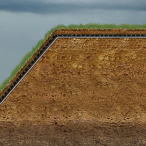 Dyke construction with reduced revetment height