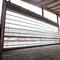 Interior view of the 16 x 5.5 m folding door at the front of the machine hall.