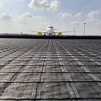 Airplane on runway with HaTelit
