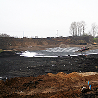 Geosynthetics for sludge pond remediation: securing, reinforcing and protecting the environment