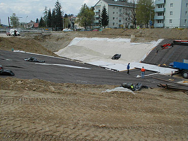 Installation of geosynthetic clay liners by workers