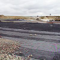 Basetrac Grid geogrid in use to reinforce the base course on a construction site