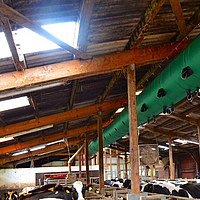 Bottom view of the Tube Air ventilation hose in a cow shed