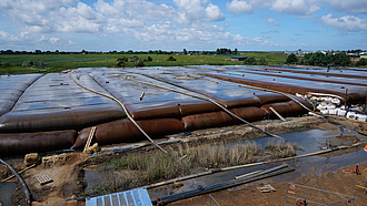 Geotextile solutions: Containers, hoses and concrete mats for coastal protection