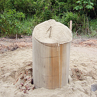 A filled Ringtrac® column protruding from the ground