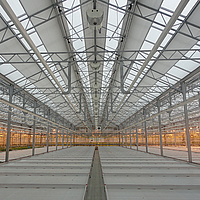 Greenhouse with environmentally friendly UmbraTex shading system